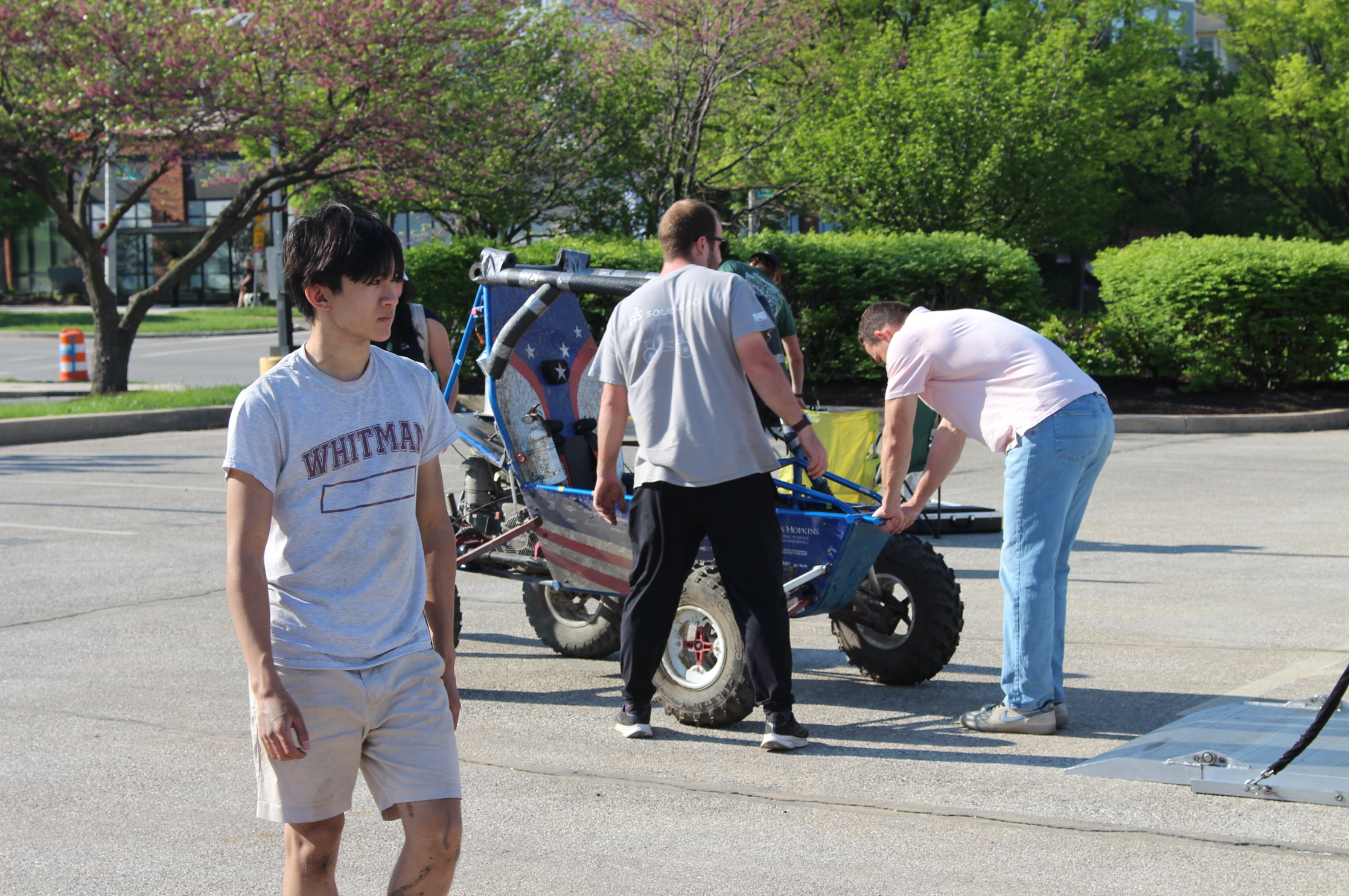 William Tun with the Johns Hopkins Baja SAE vehicle